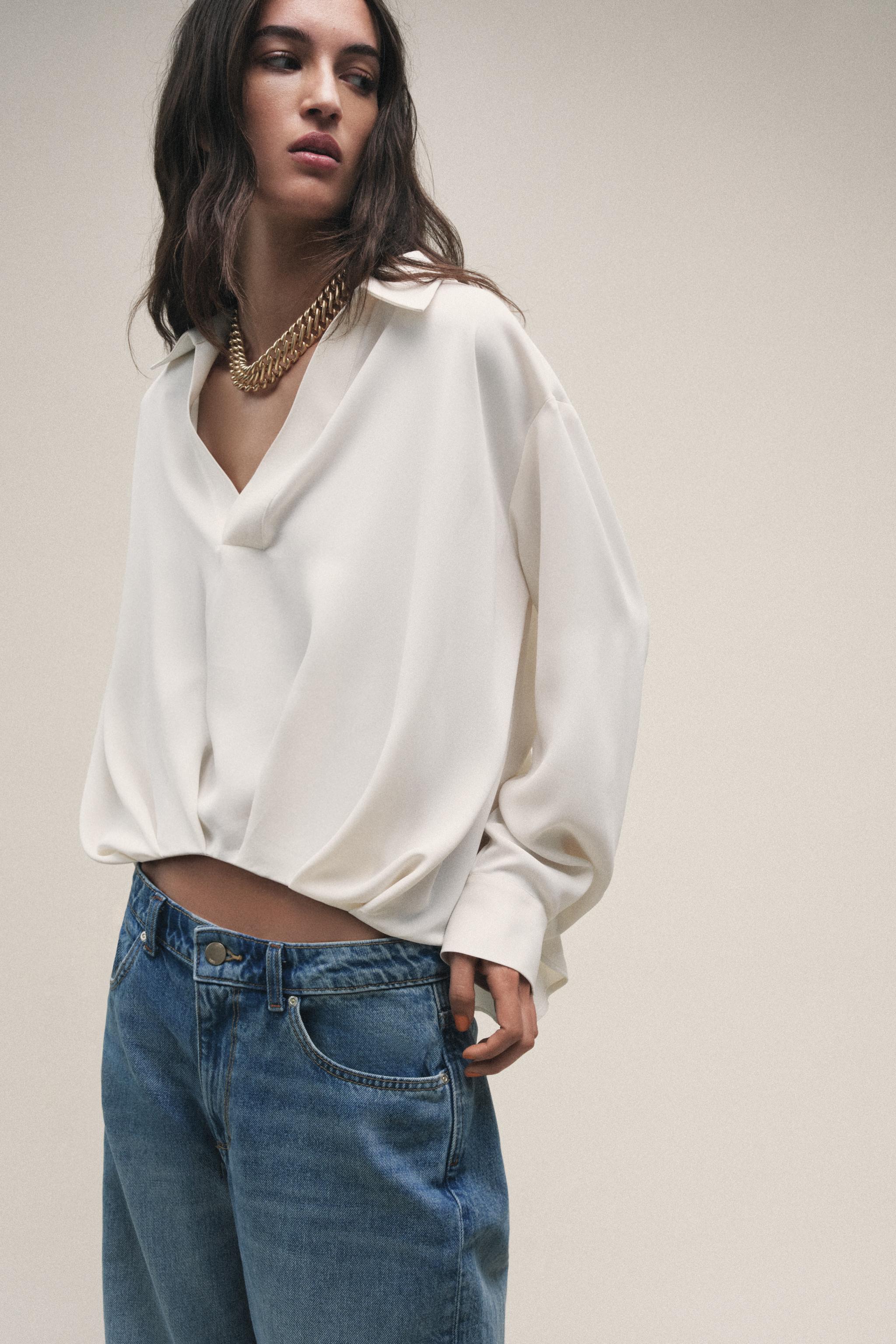 CHEMISE À PLIS ET BAS ASYMÉTRIQUE